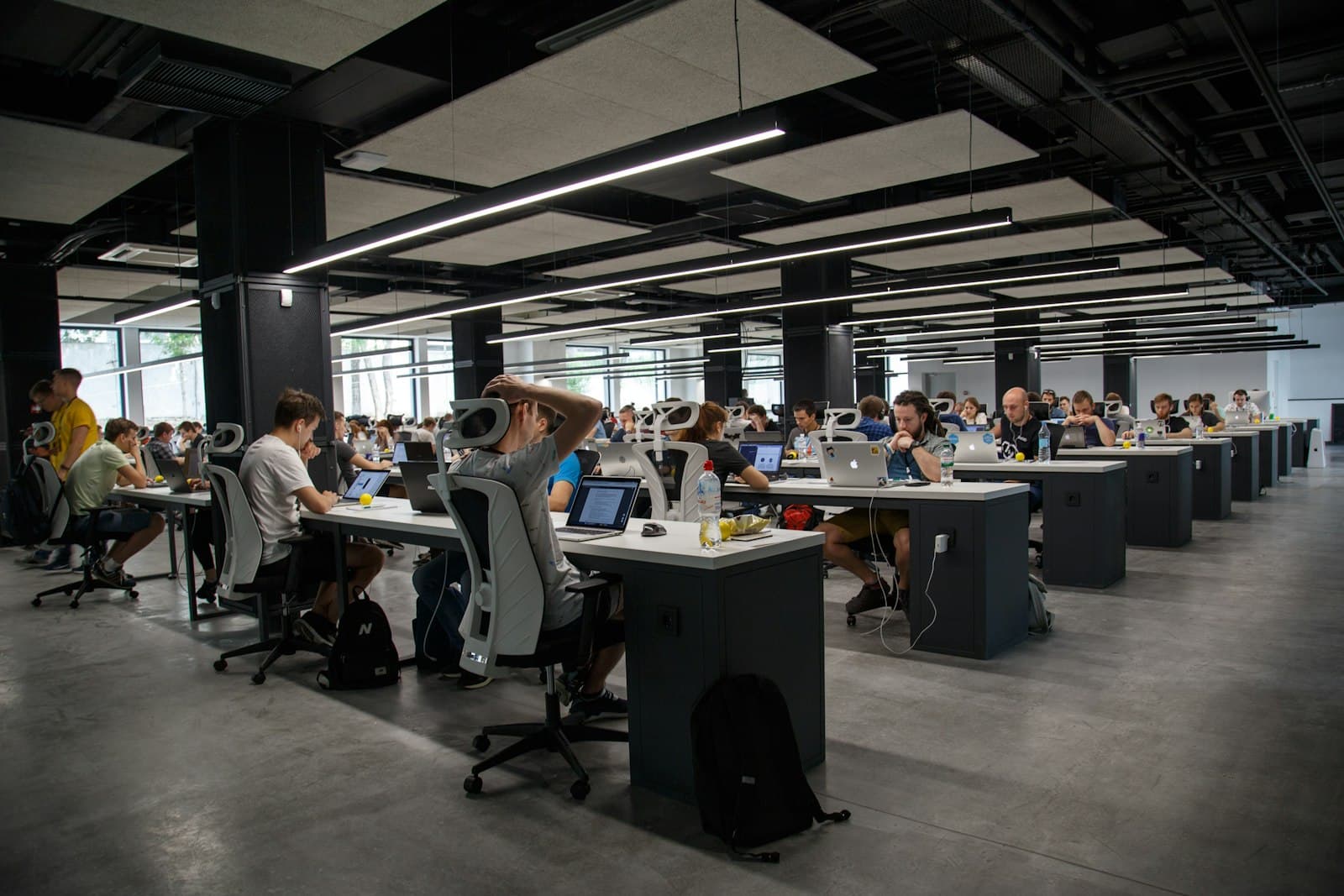 Open plan office with staff working at computers
