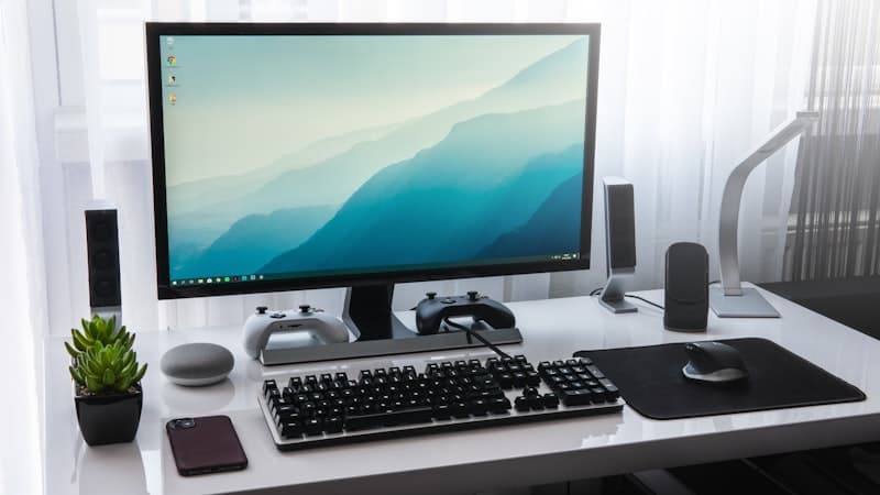 Desktop computer and monitor on an office desk