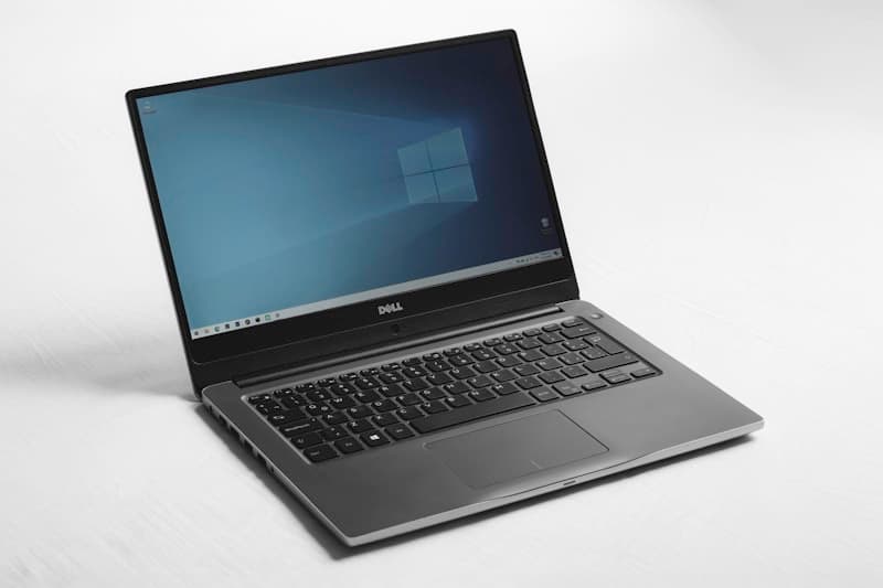 Business laptop on a plain background